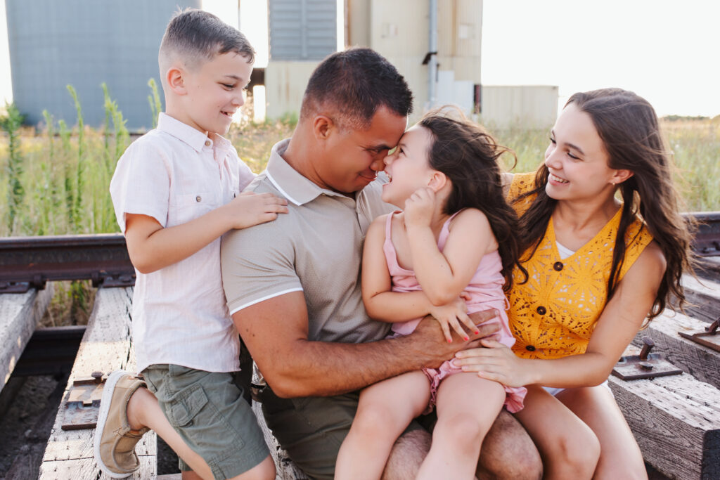 family posing during fall mini session in North Texas