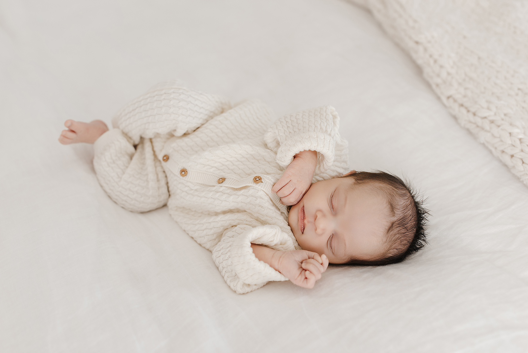 Newborn baby in neutral tones in McKinney TX photoshoot