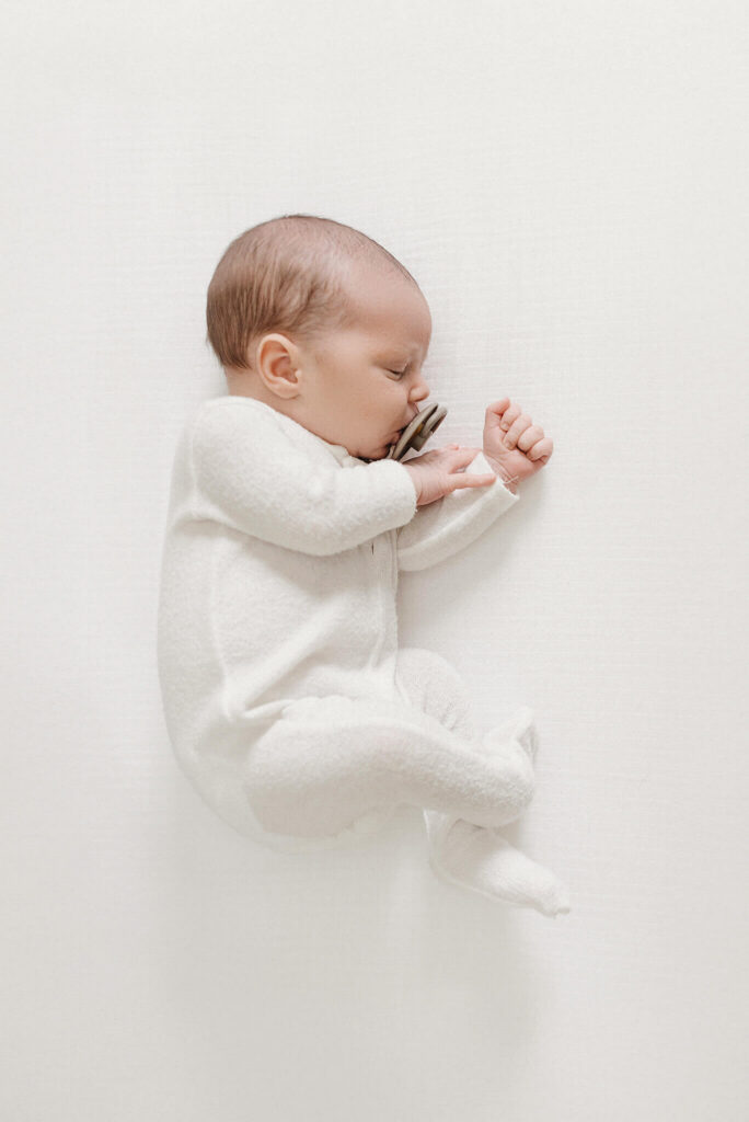 Newborn baby boy in neutral tones lifestyle session McKinney TX
