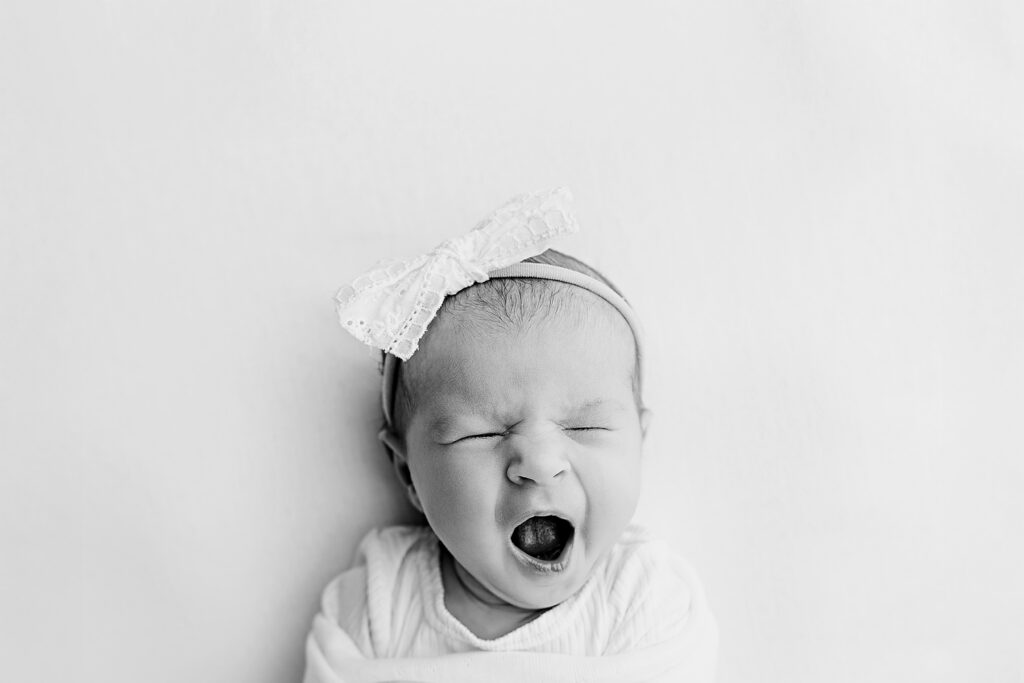In-home lifestyle newborn photography session McKinney TX, natural light